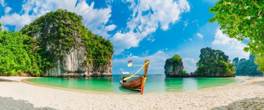 Phuket Beach with boat for travellers